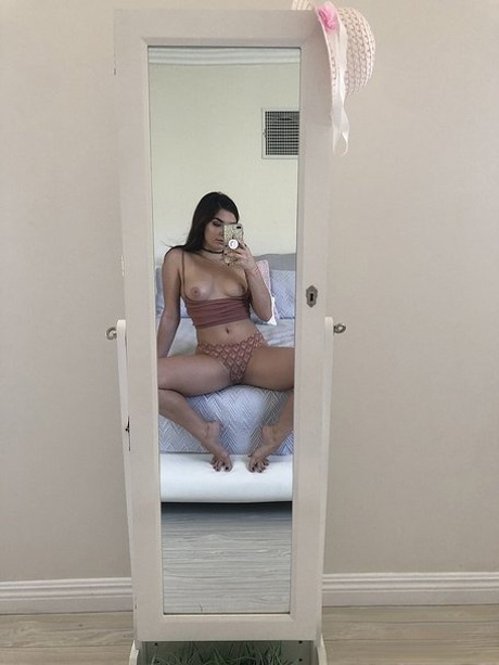 Delightful short brunette Keira Croft spreading her cheeks in a hotel room