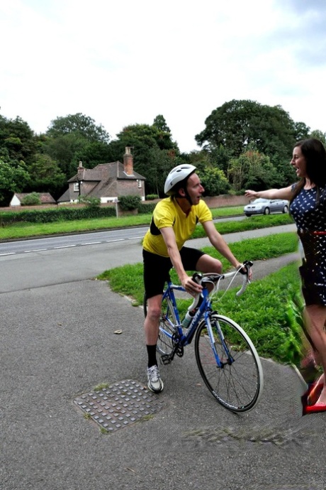 Naughty UK housewife invites a passing cyclist to stick his dick in her ass