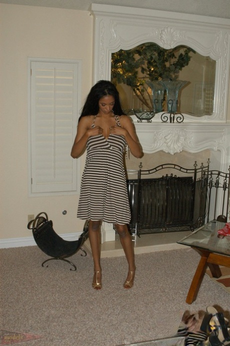 Black dime Tyra Moore uncups her huge boobs outdoors in her modeling debut