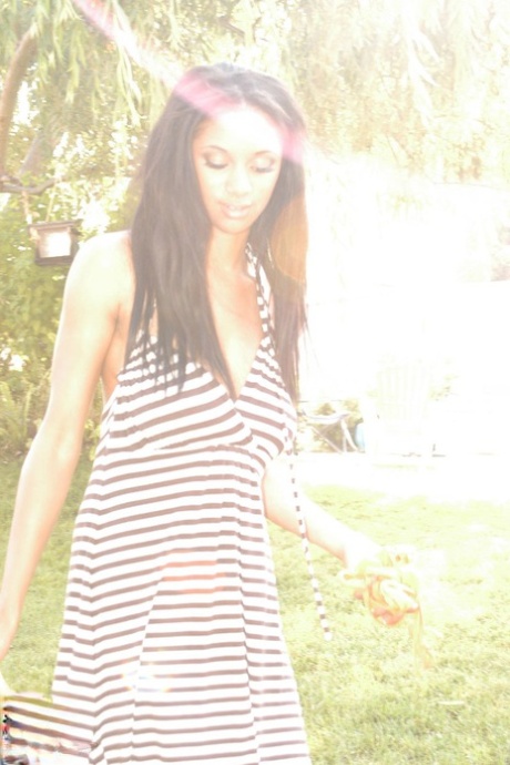 Black dime Tyra Moore uncups her huge boobs outdoors in her modeling debut