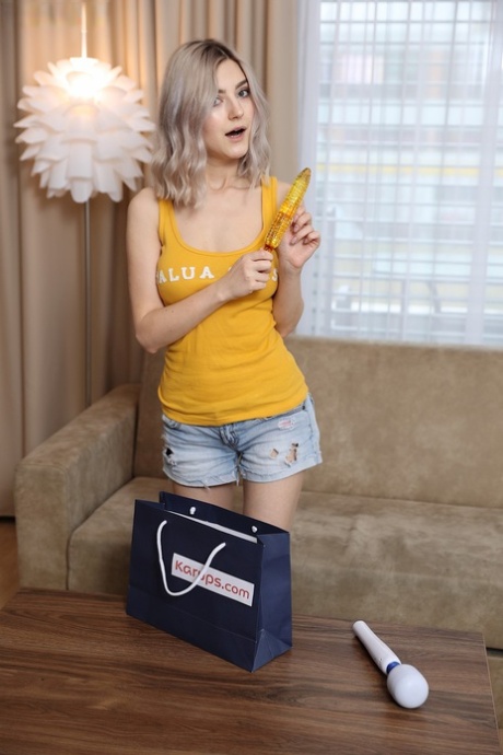 Amateur girl Eva Elfie bare her big teen tits before toying her bald pussy