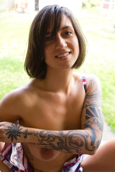 First timer Liandra Dahl parts her twat after getting naked in front of window