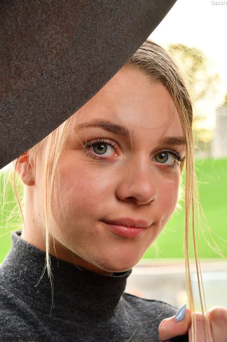 Amateur stunner Gabbie Carter revealing her huge natural boobs poolside