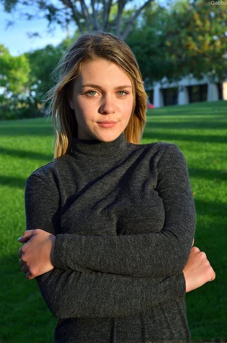 Amateur stunner Gabbie Carter revealing her huge natural boobs poolside